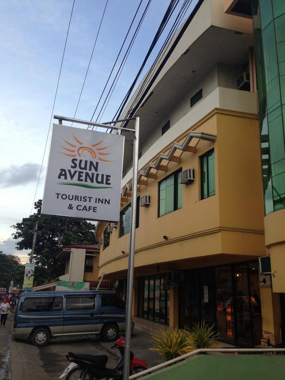 Sun Avenue Tourist Inn & Cafe Тагбиларан Экстерьер фото